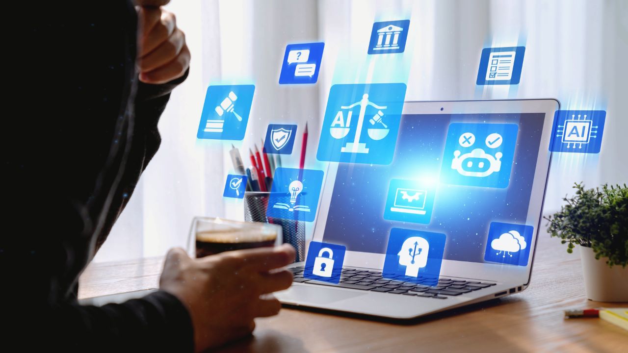 een laptop die de onderwerpen van AI geletterdheid projecteerd